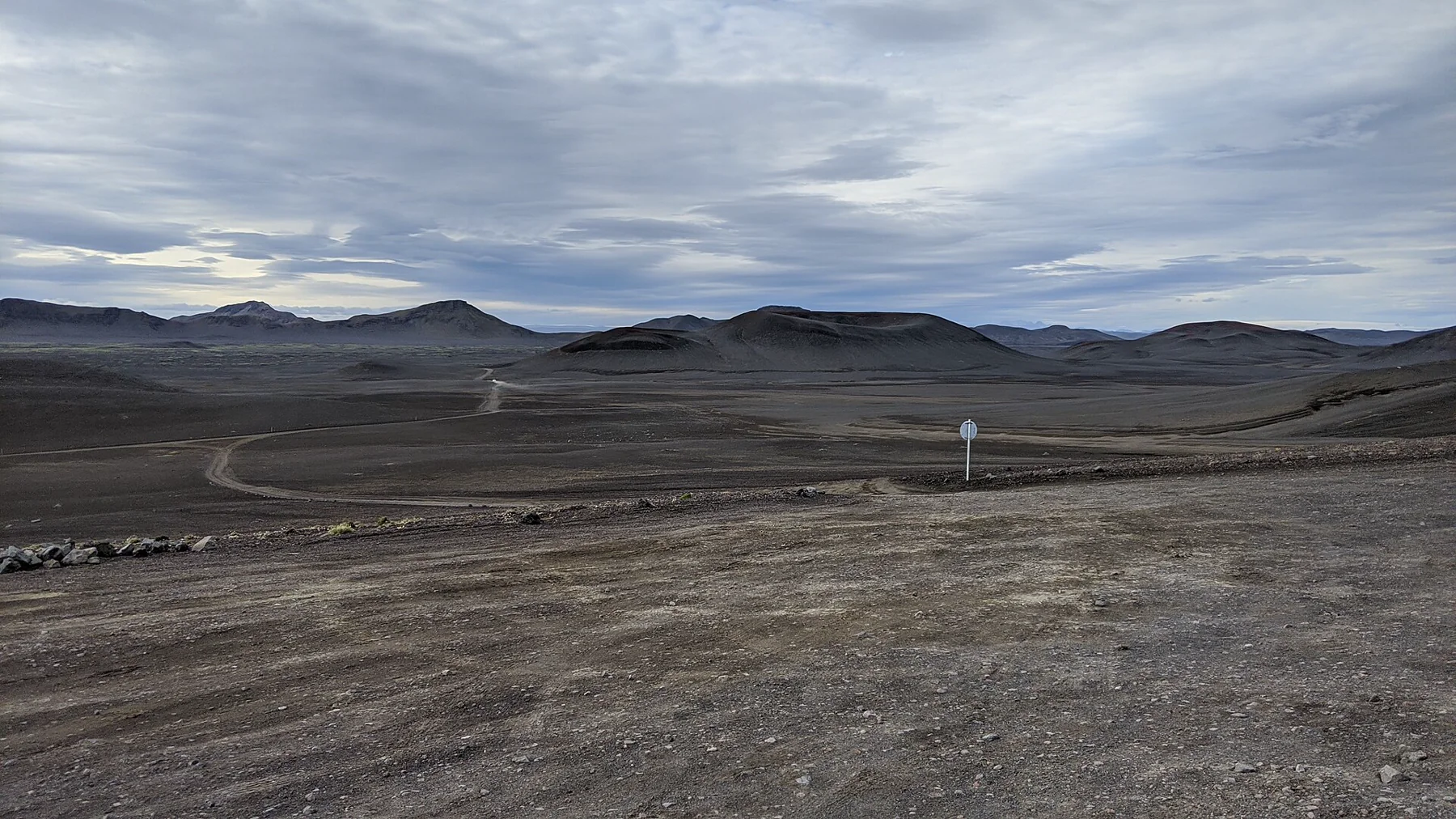 Open volcanic terrain and unpaved highland road near Landmannalaugar