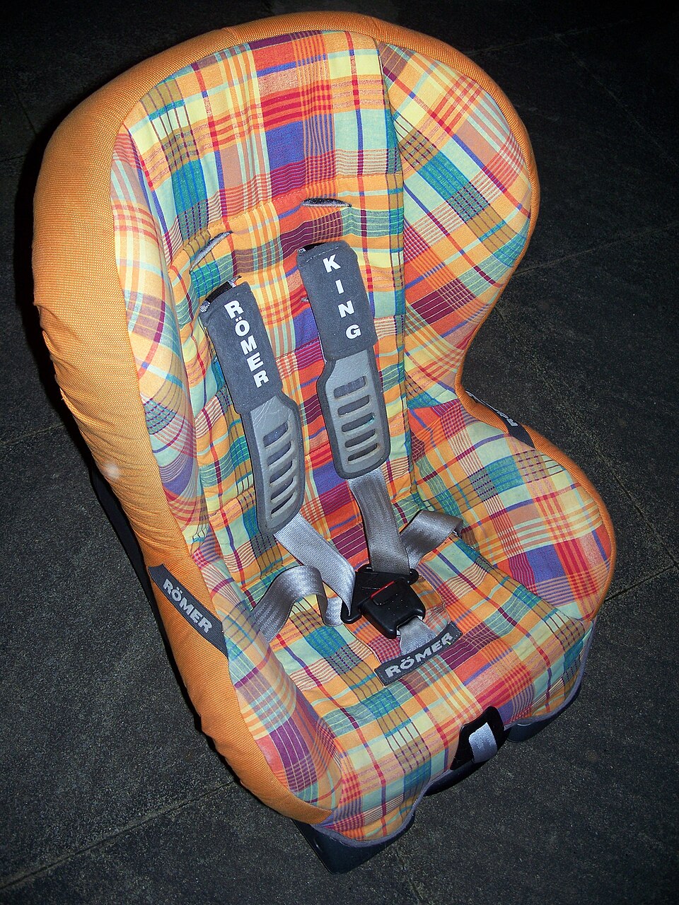 A child car seat fitted inside a vehicle