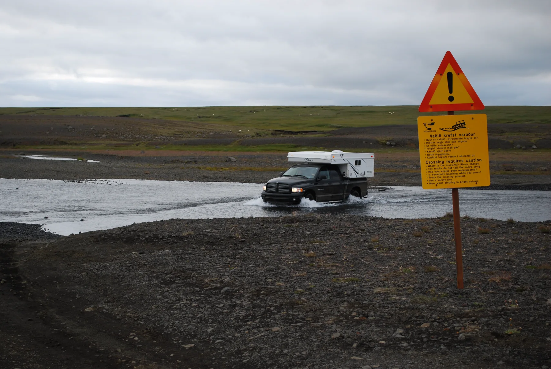 A vehicle crossing a river on an Icelandic F-road