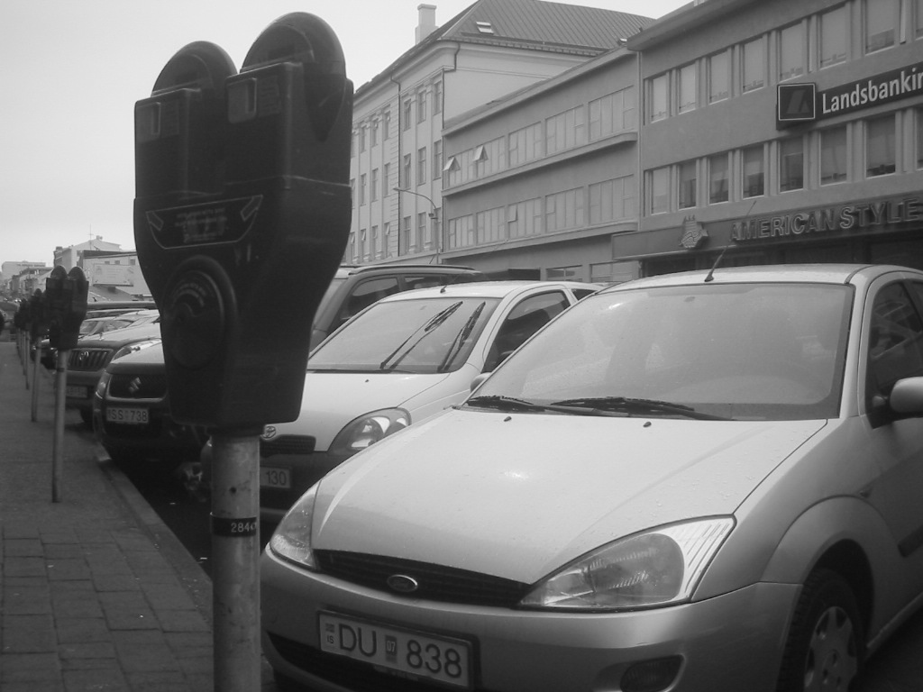 A street parking space and parking meter in central Reykjavík; the photograph illustrates how city parking works and does not represent current rates or available spaces