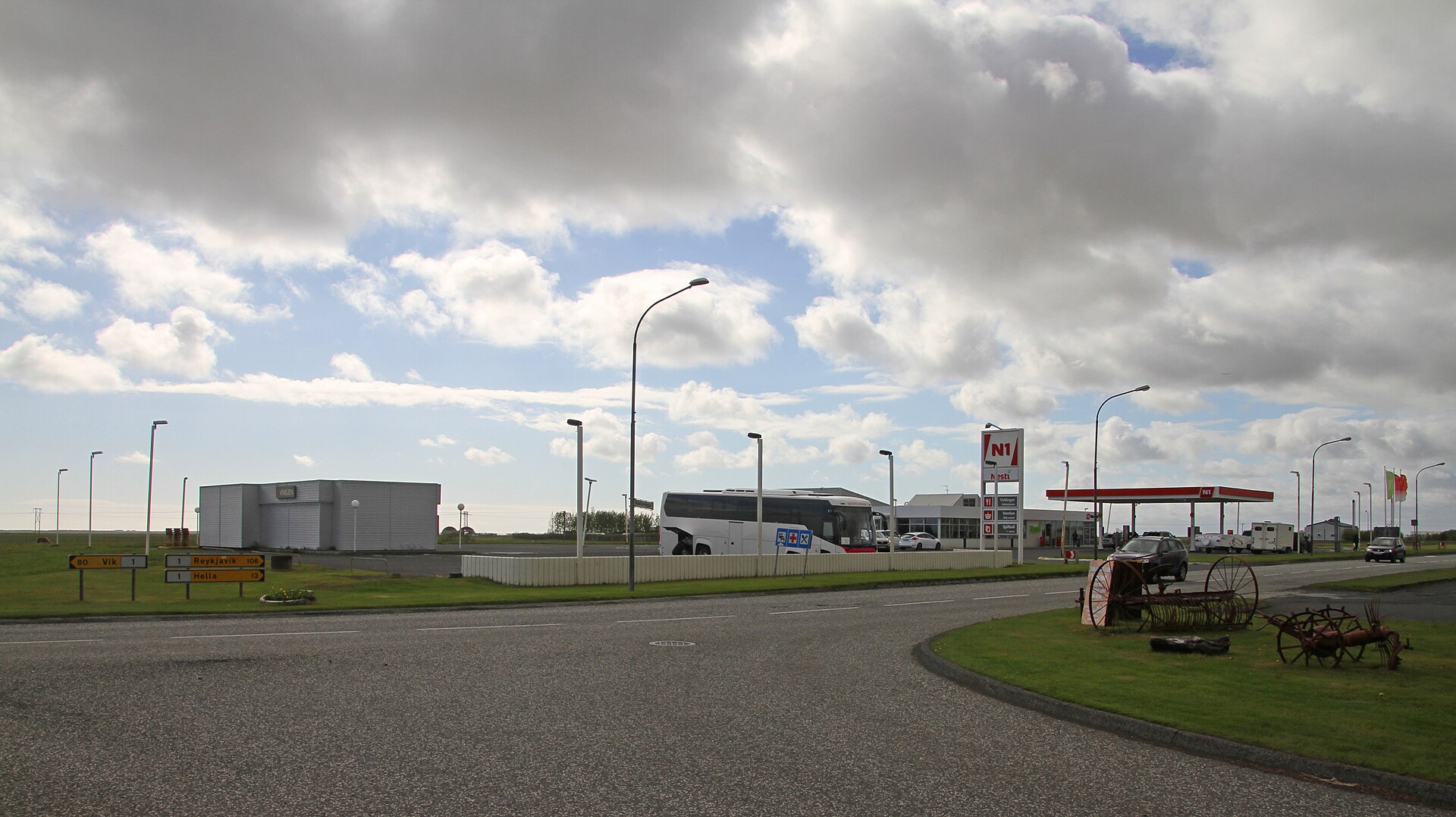 The N1 service station and road signs beside Route 1 in Hvolsvöllur; not a representation of current fuel prices, payment options or opening hours
