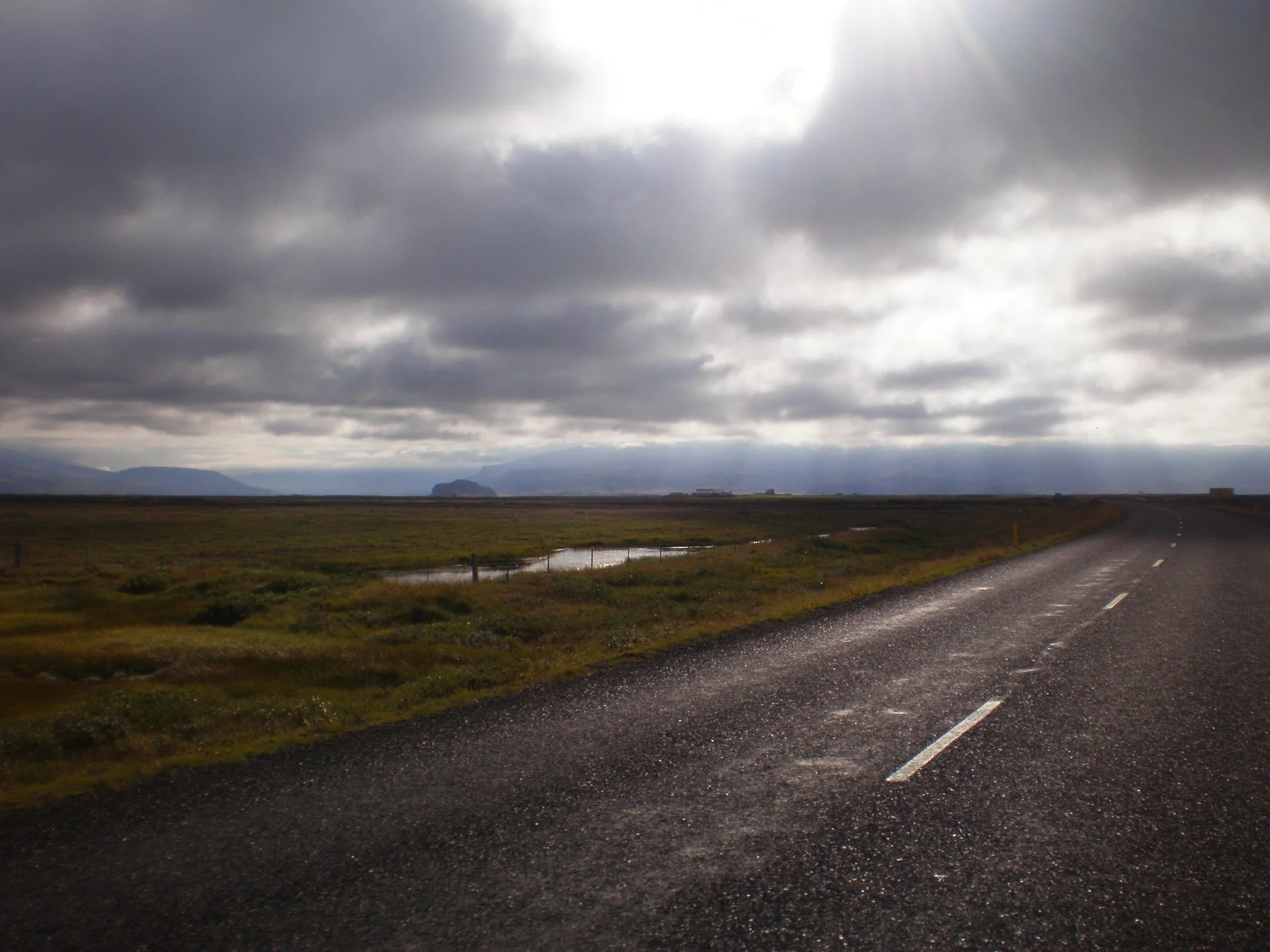Iceland road and low cloud after rain