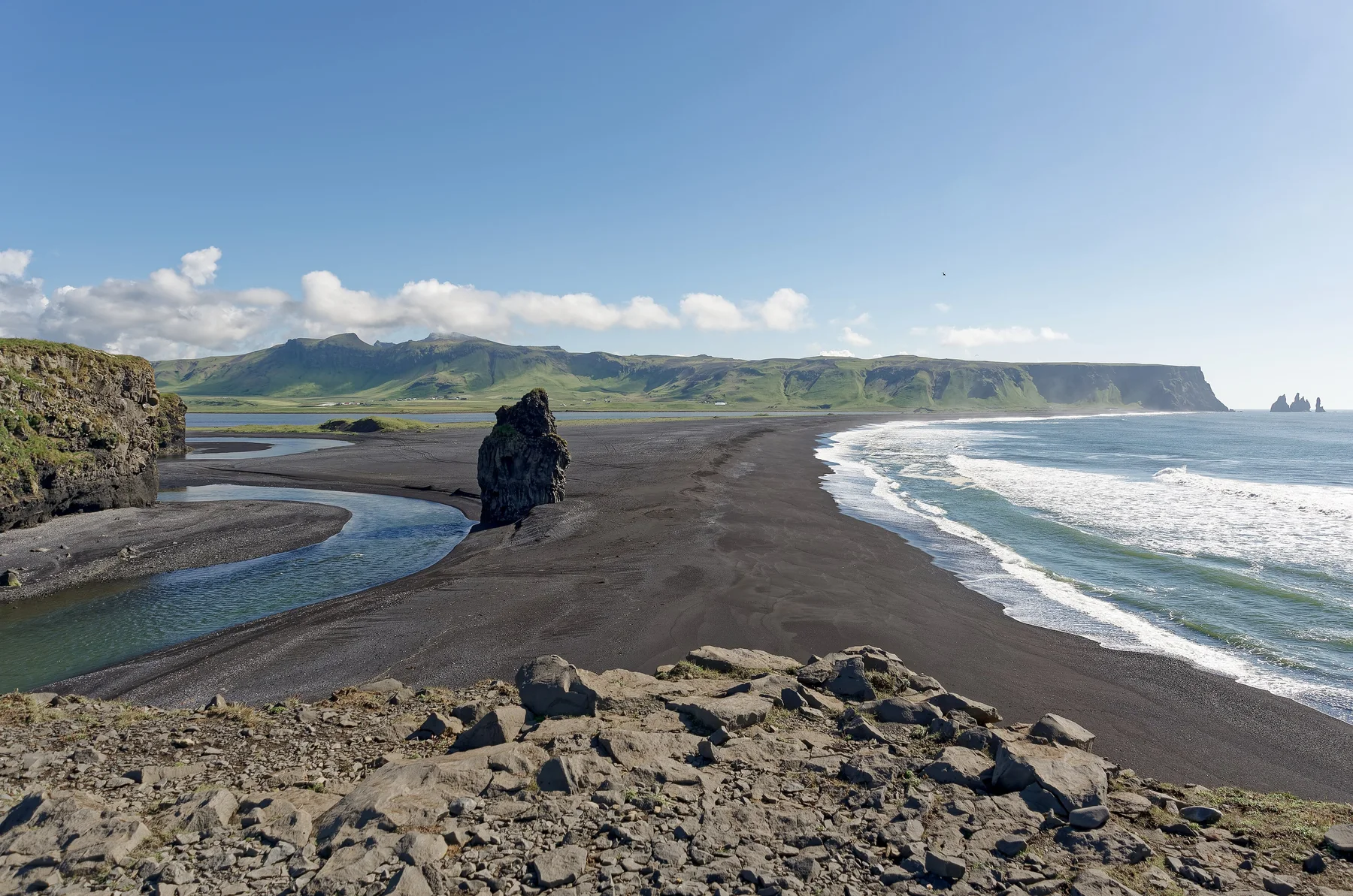 Reynisfjara black beach and mountains seen from Dyrhólaey