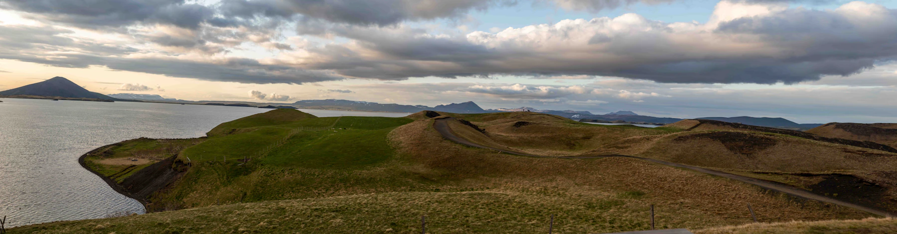 Mývatn area lake shore, road, and low hills